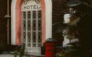 Grand hotel building exterior illustrating the 7-day rule for hotel taxes