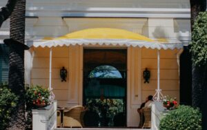 Entrance of a luxury hotel, the kind of property where 100% bonus depreciation benefits hotel investors