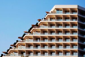 Resort hotel building exterior compared in hotel vs multifamily tax benefits