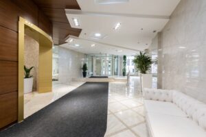 Modern hotel lobby illustrating passive losses from real estate through hotel depreciation
