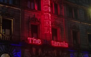 Hotel exterior at night illustrating hotel depreciation recapture at exit